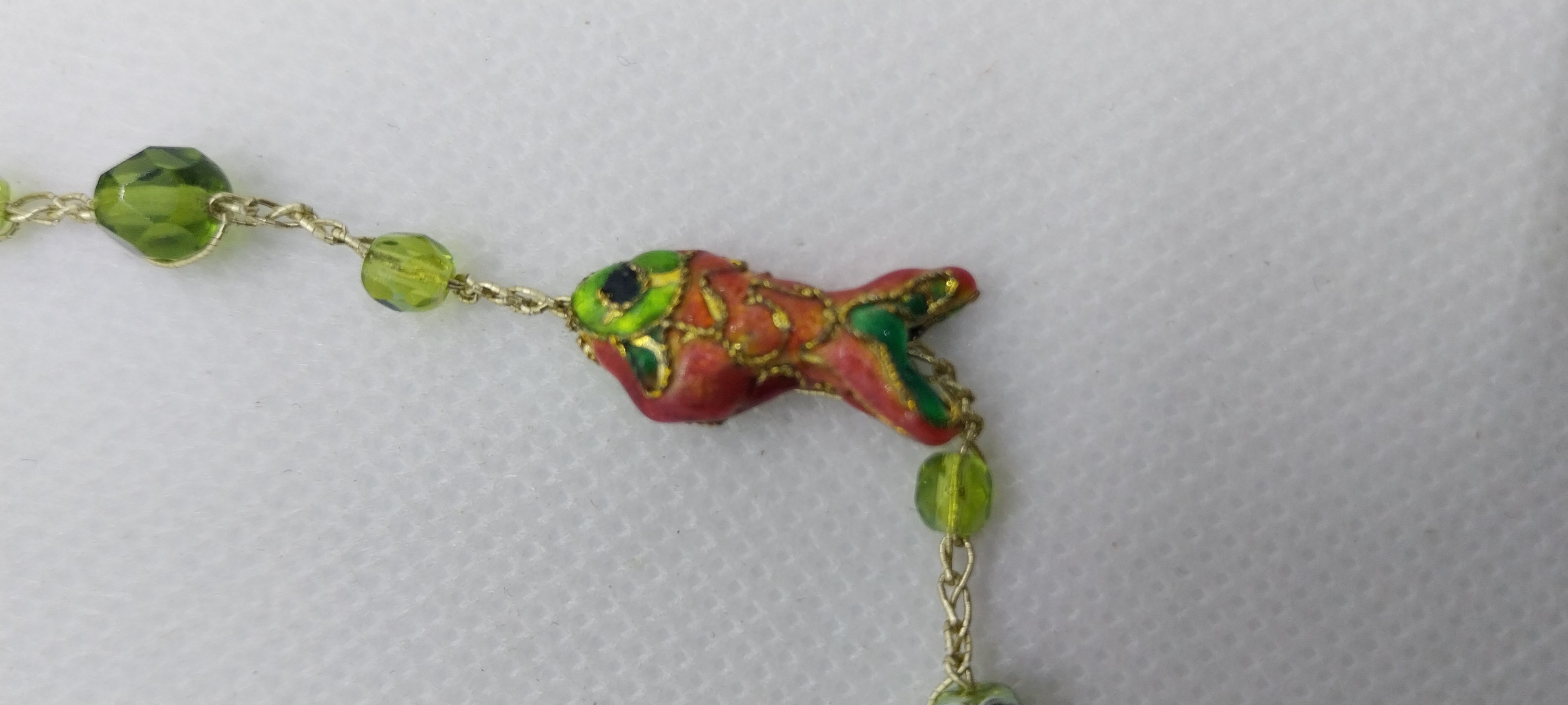 Green crystal bead anklet & orange and green fish bead