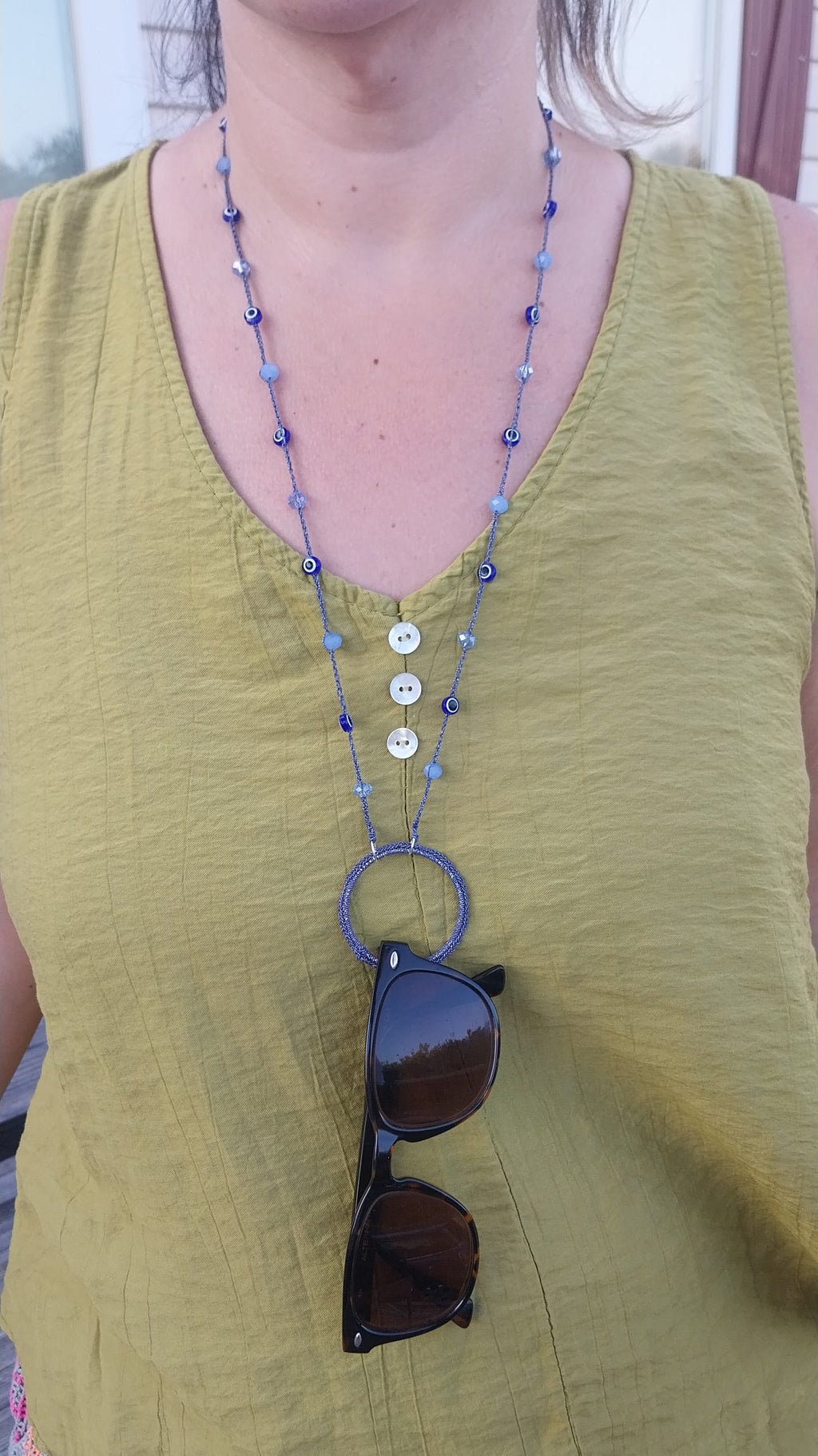 Protective eyewear holder