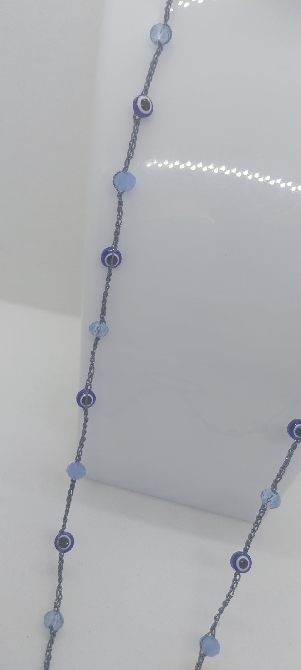Protective eyewear holder