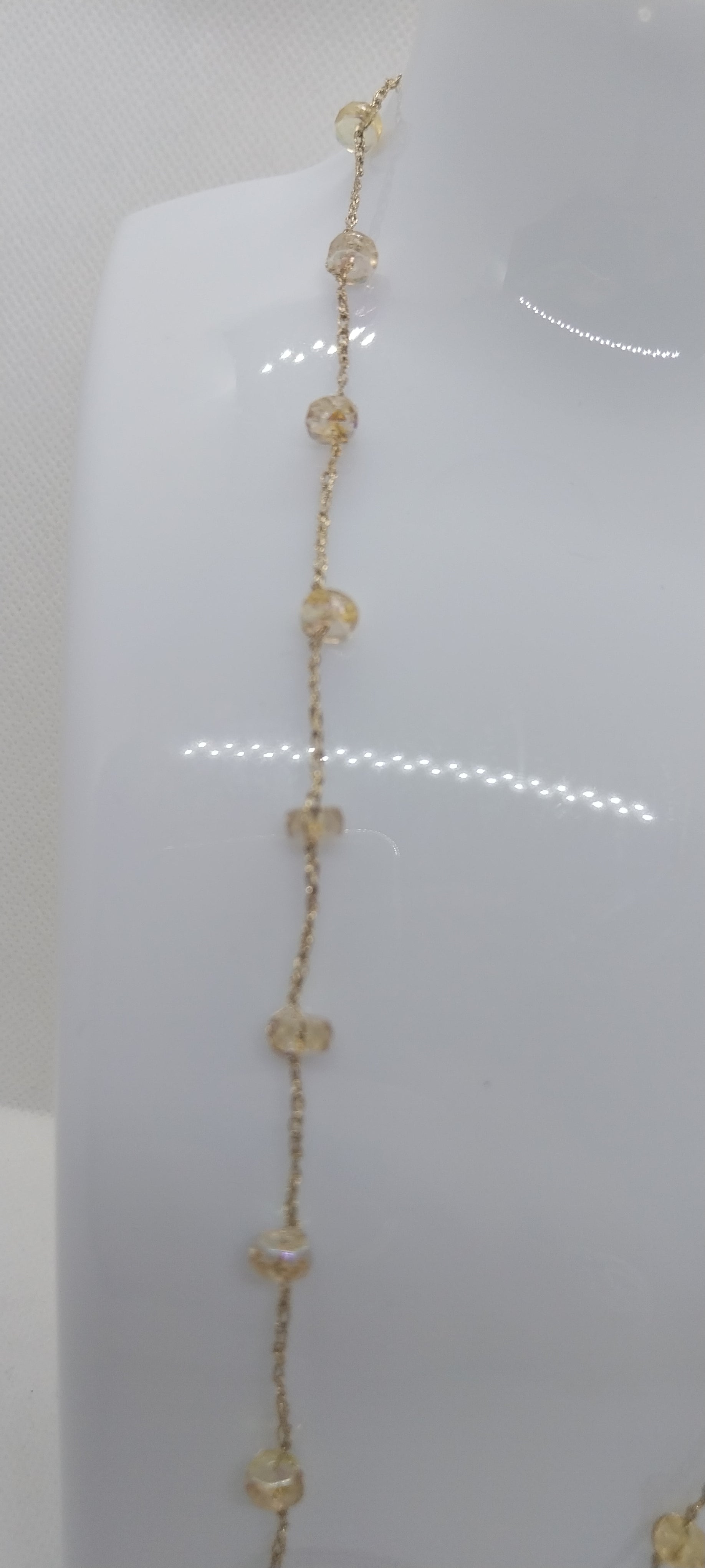 Porte-lunette perle reflet jaune