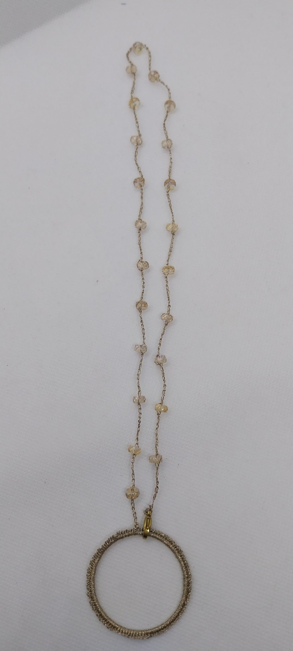 Porte-lunette perle reflet jaune