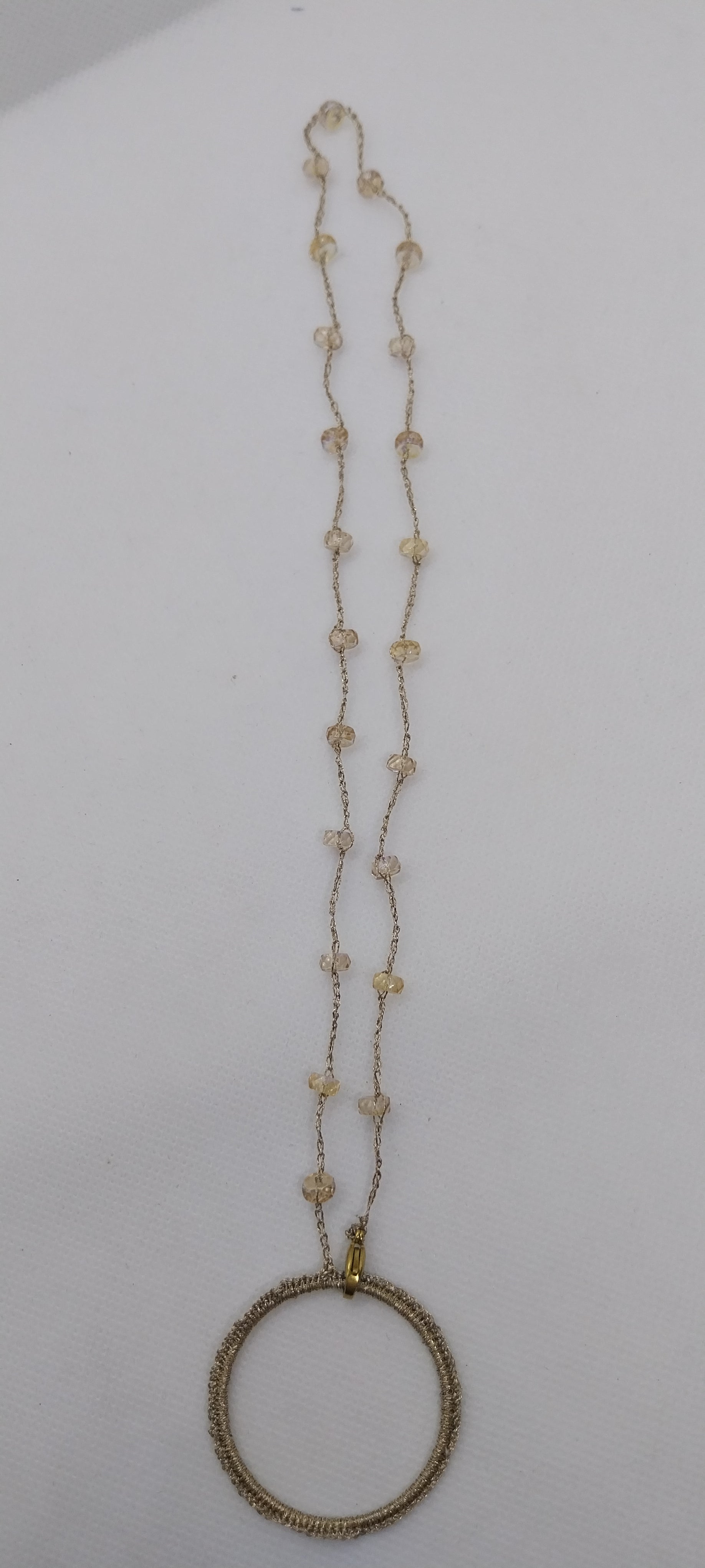 Porte-lunette perle reflet jaune