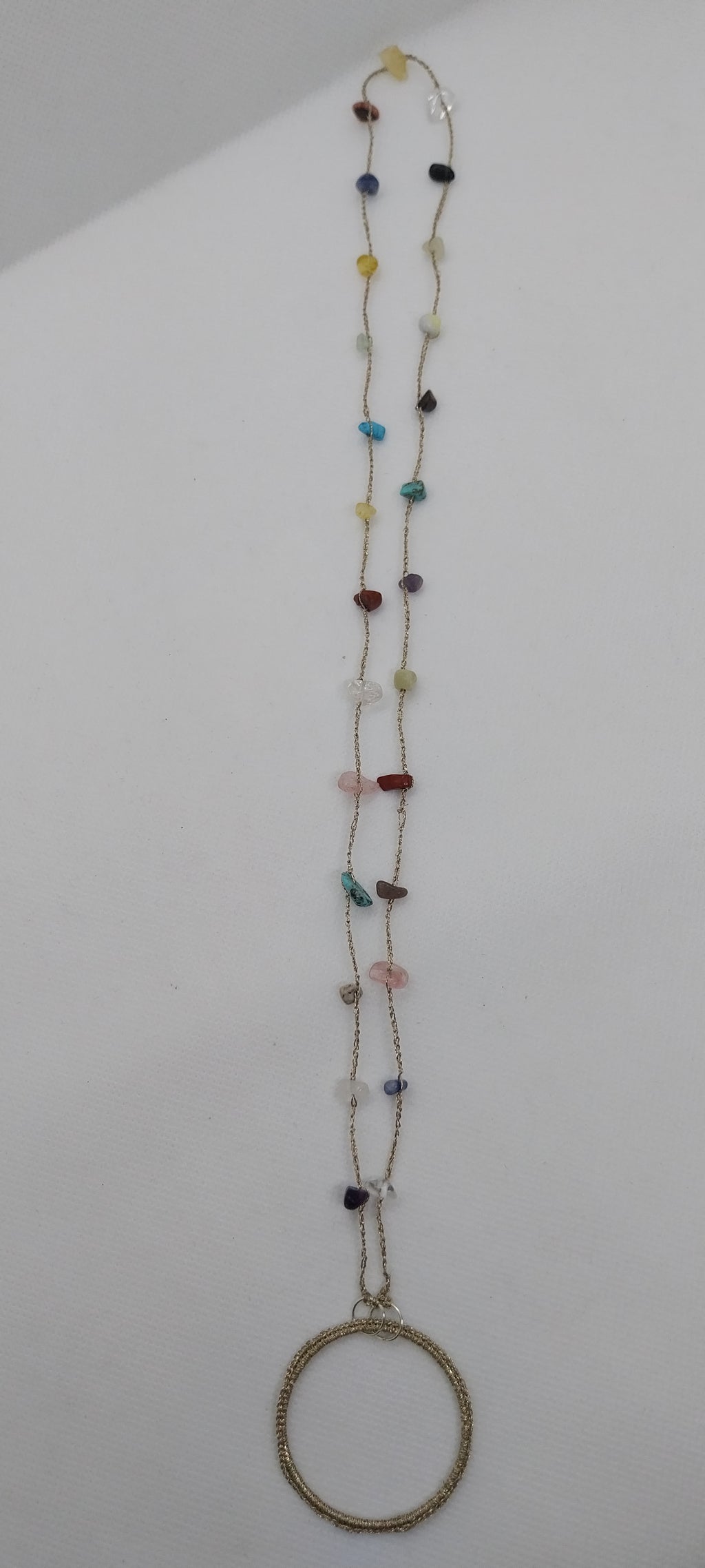 Eyeglass holder with gemstone