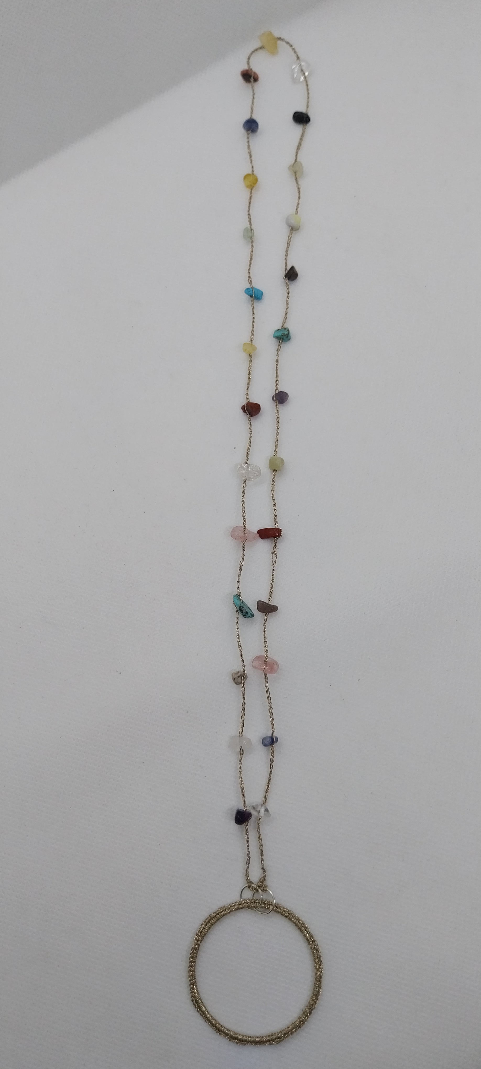Eyeglass holder with gemstone