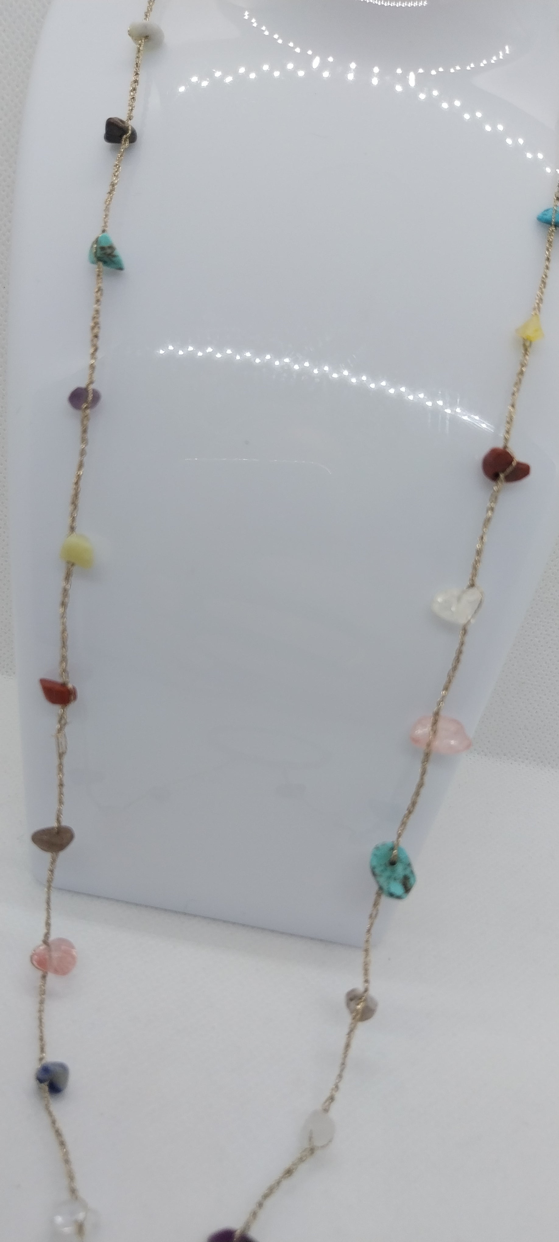 Eyeglass holder with gemstone